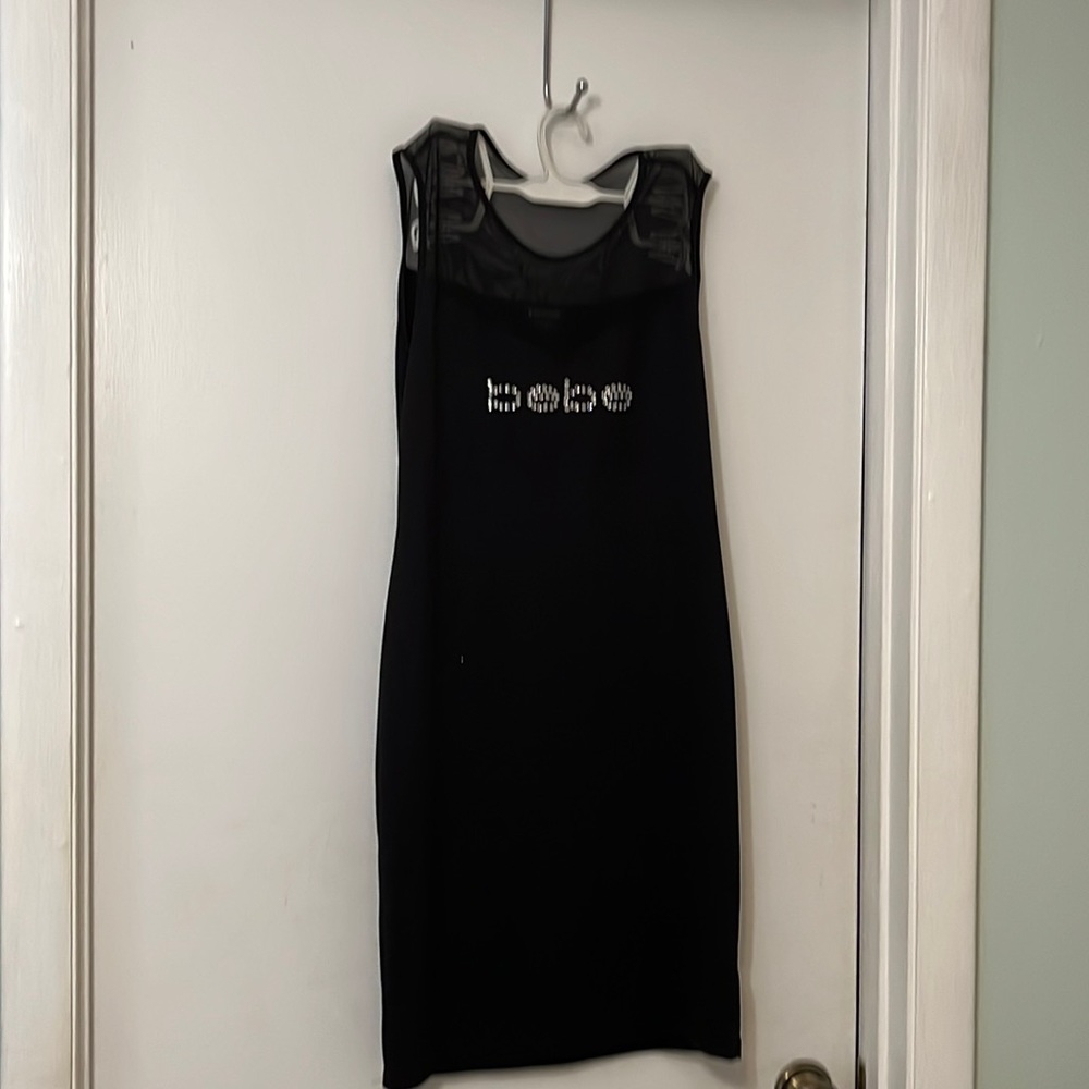 Bebe size medium black mini dress for sale! Perfect for girls night and summer!